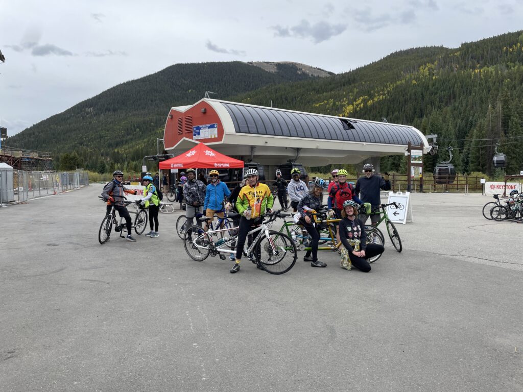whole group smiling at ski lift